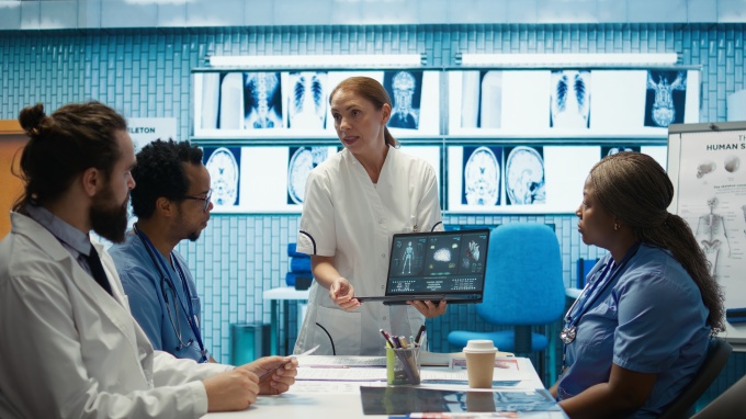 Group of medical professionals discussing examination results....