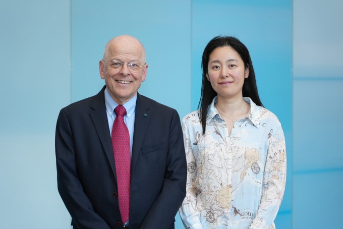 WashU Medicine researchers Graham Colditz (left) and Shu (Joy) Jiang (right),...