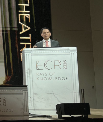 Sergey Morozov at the podium during the ECR 2026 congress....