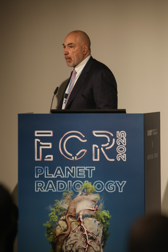 Dr. Alberto Spinazzi during a presentation at the ECR...