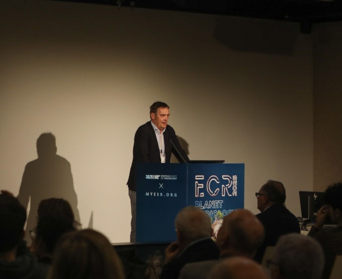 Prof. Dr. Dr. Günther Schneider during a presentation at the ECR...